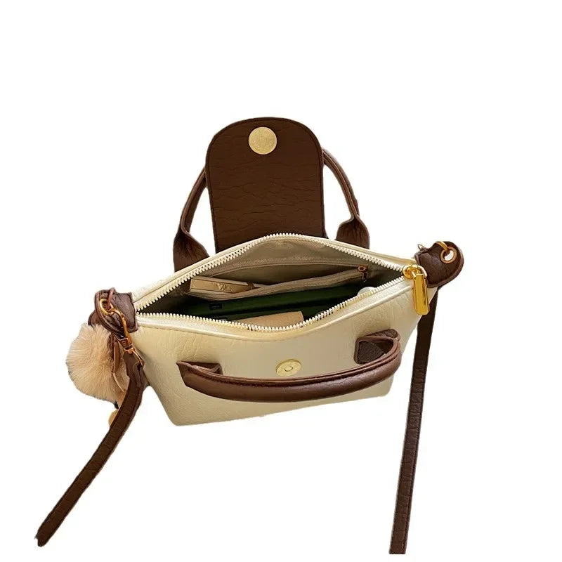 Bolsa crossbody de ombro de grande capacidade em formato de bolinho elegante para deslocamento no outono e inverno com design de bloco de cores