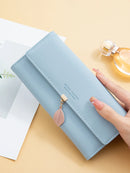 Venda quente primavera e verão nova feminina couro do plutônio japonês e coreia do sul pequena folha fresca pingente três dobras saco grande capa